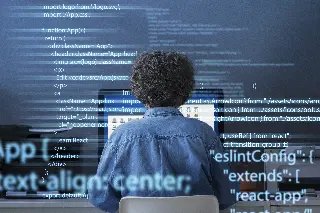 programming-background-with-person-working-with-codes-computer
